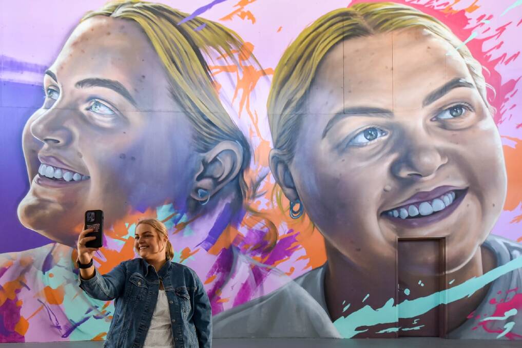 Molly Croft at the unveiling of the mural depicting her at Accor Stadium in Sydney. Picture supplied