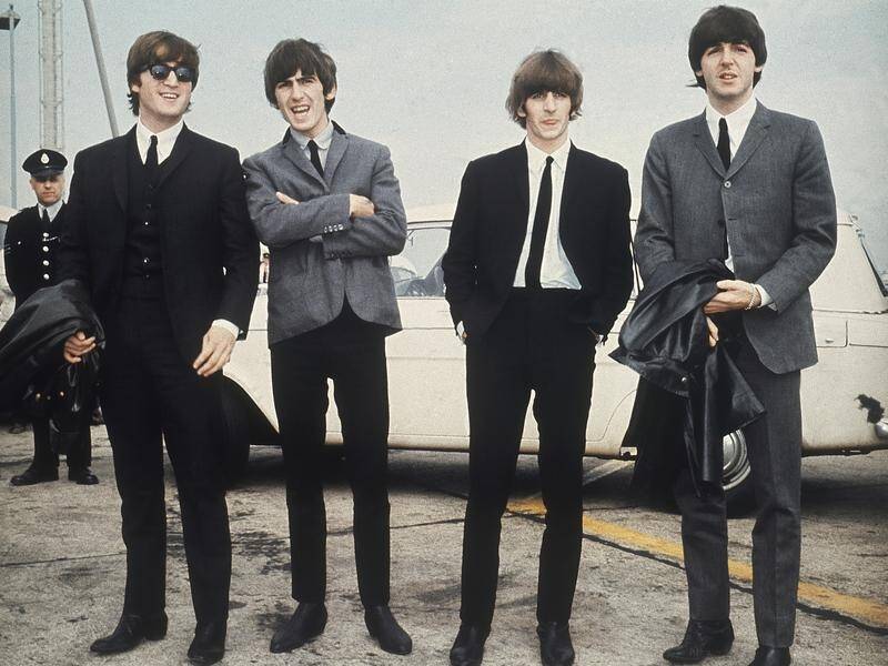 Four biopics of John Lennon, George Harrison, Ringo Starr and Paul McCartney are in the works. (AP PHOTO)