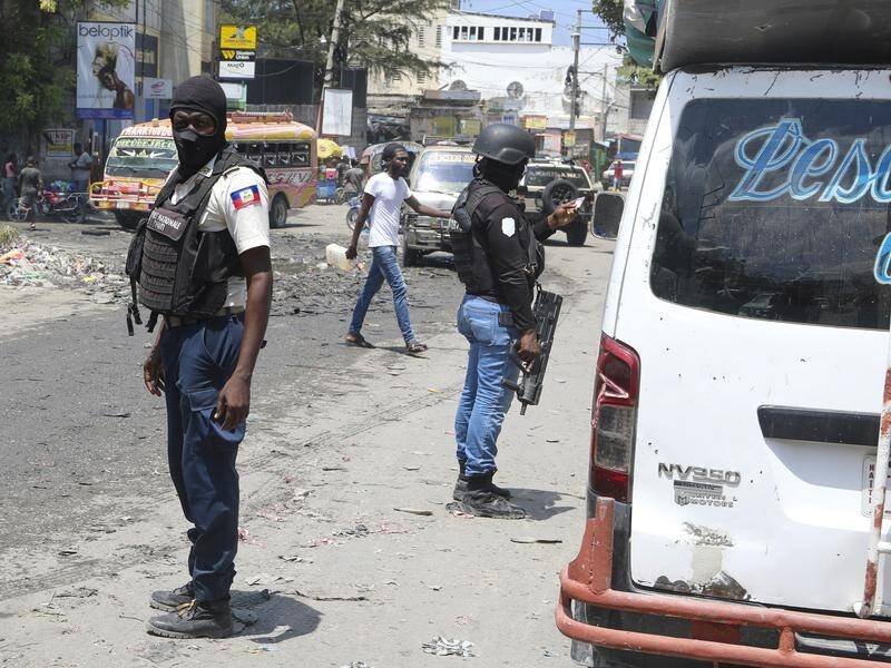 Haiti's gangs say their siege on the capital is a battle to oust Prime Minister Ariel Henry. (AP PHOTO)